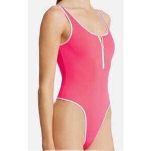 Alo Yoga Super Nova bodysuit in coral + white